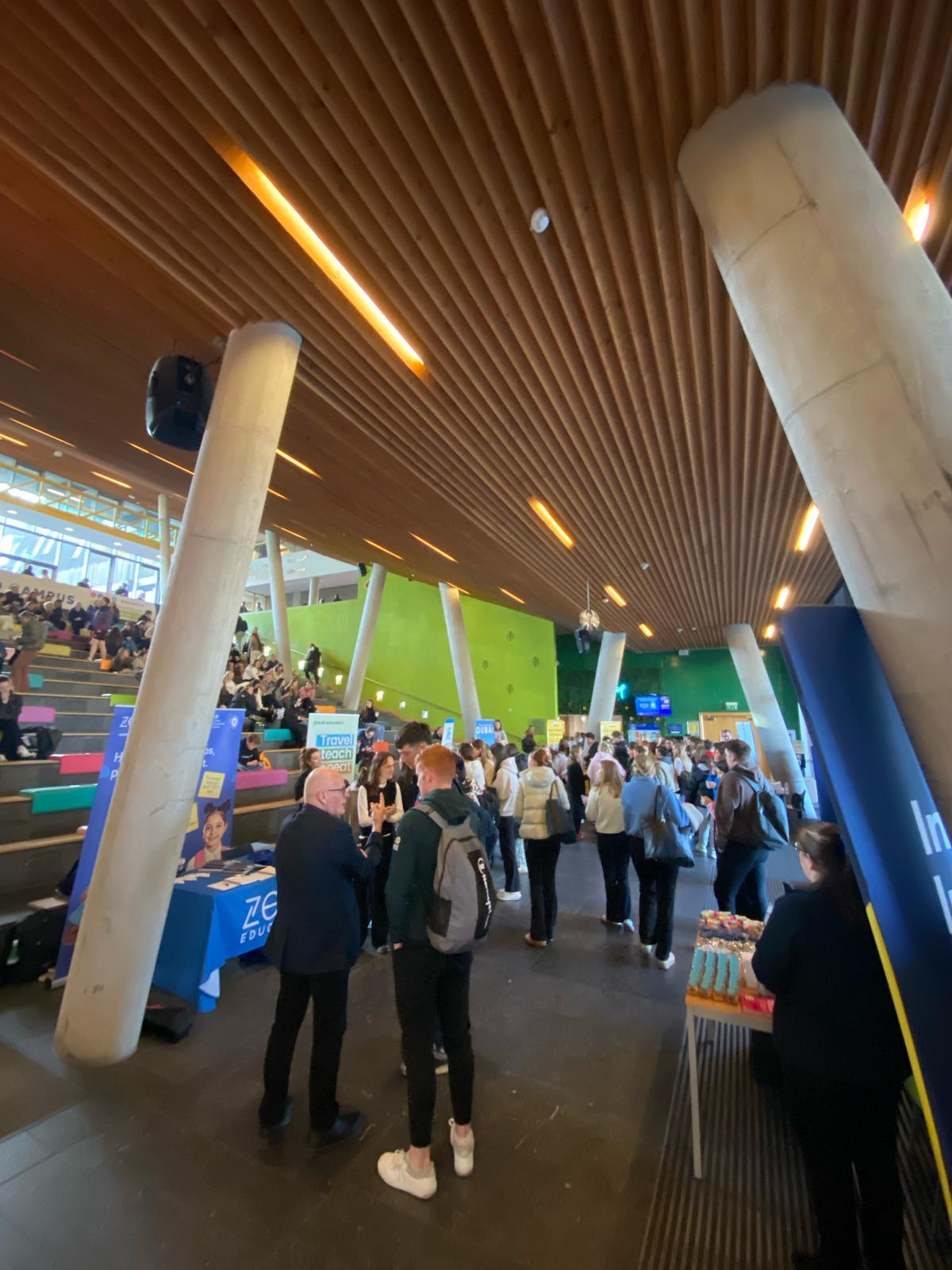 A photo of students and stalls from the MISU Teacher Recruitment Fair in the TARA Forum in February 2025.